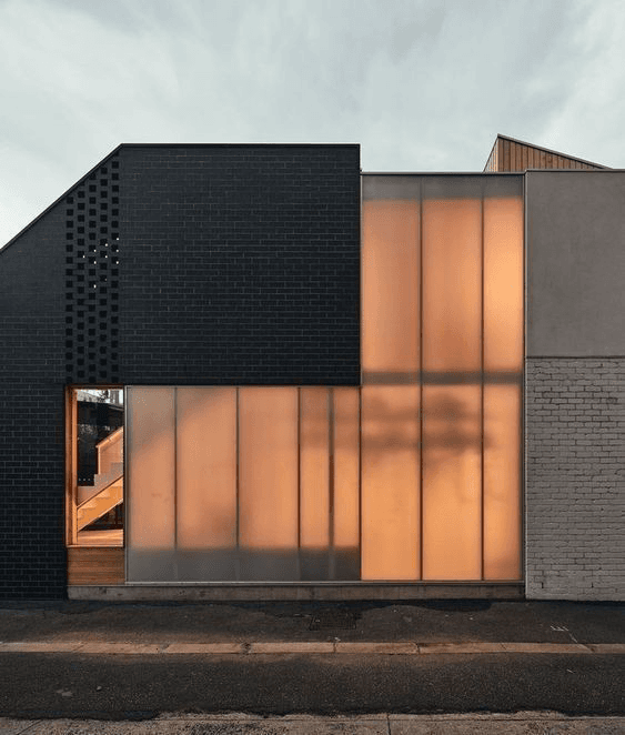 Modern facade with illuminated translucent panels